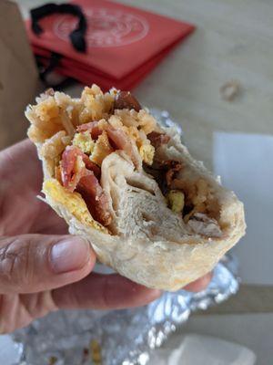 Tail end of the breakfast burrito. Disappointing with the lack of filling and the amount of tortilla ratio.