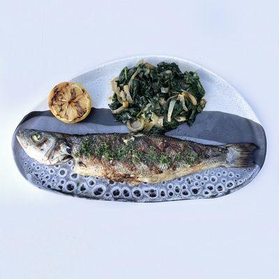 Branzino- Grilled whole Mediterranean sea bass with swiss chard