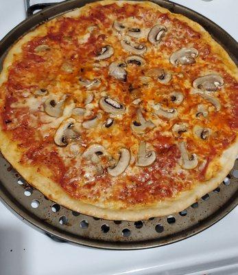 Hubby tossed the dough, added the ingredients and baked for 13 mins. Delish!!! And he had a lot of fun making it too.