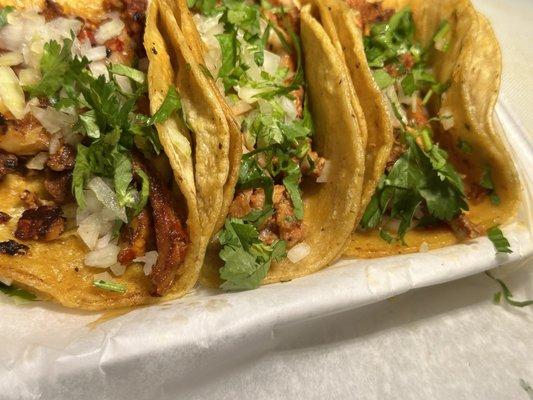 Tacos de pastor ( marinated pork tacos )  With onions & cilantro