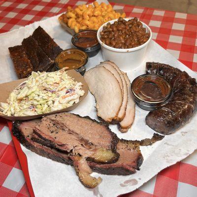 Three meat combo (brisket, ribs, turkey), with sausage added on.