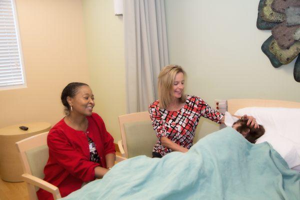 Our compassionate staff and volunteers comforting a patient.