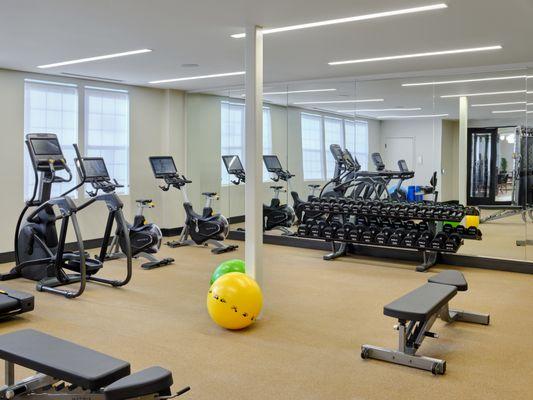 Full service fitness center with free weights, spin bikes and more