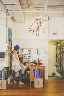 Co-founders, Audra & Jessica tidying up the desk.