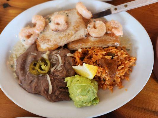 Mexican fish with rice and refried beans