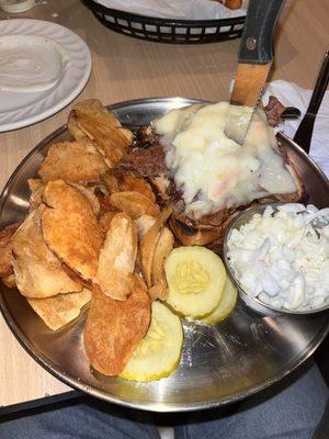 Sandwich in Texas toast with slaw and cheese. Meat was pork. This was so good!