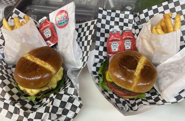 Our 5-0 burger and Clasico burger with fries and hand pies