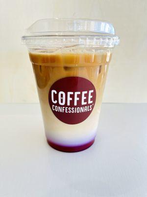 Iced latte with fresh blueberry syrup