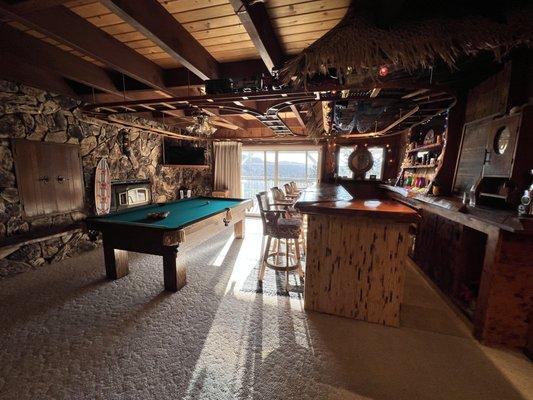 The Place to Be tiki bar! Rent this space for your own pool tournament with friends and family!