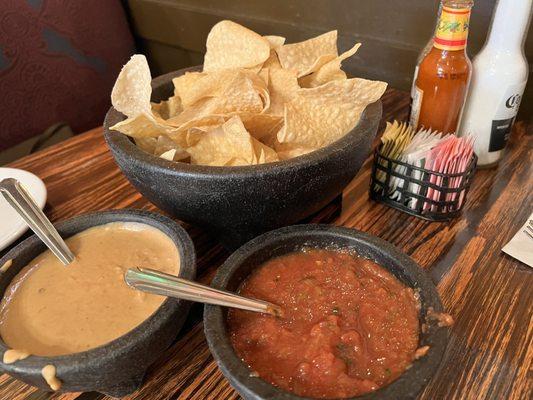 Chips and salsa & bean dip. Complimentary as long as you order an entree per person!