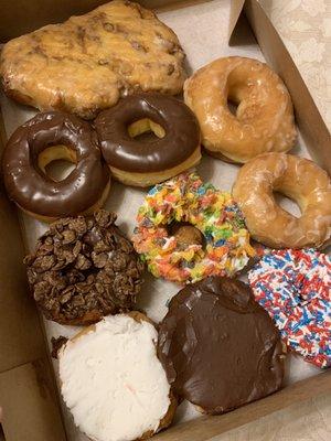 Apple fritter, chocolate glazed, glazed, chocolate and fruity pebbles, Bavarian and jelly filled