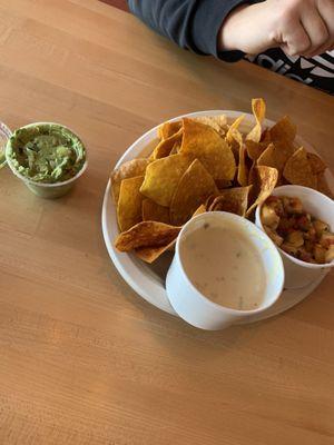 Chips, guac, salsa, queso cheese sauce