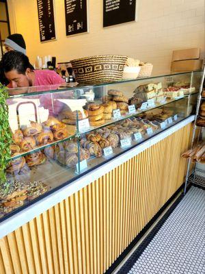 Counter of great looking pastries made according to the art of artisan baking