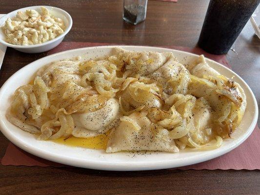 Pierogies sautéed and butter with sweet onions.