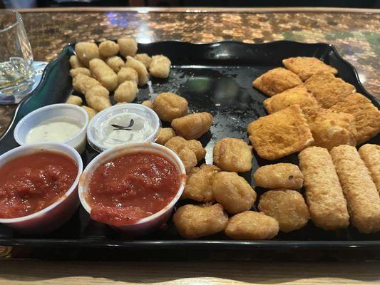 Appetizer ampler With corn fritter, fried Cheese curd, toasted ravioli