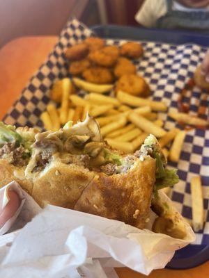 Mushroom swiss burger with avocado. French fries and nuggets