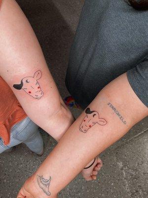 Matching cow tattoos from Ricky