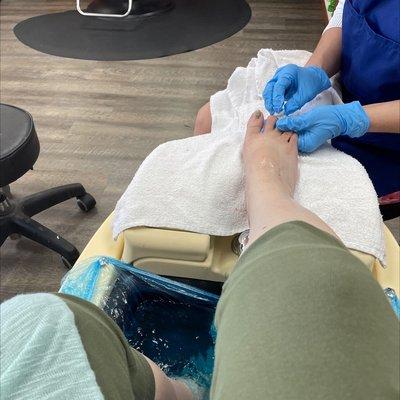 Pedicure spa with massager.