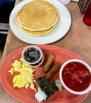 The Strawberry Pancakes Combo - served with one Egg, two Sausage Links, and 2 Strawberry Pancakes.