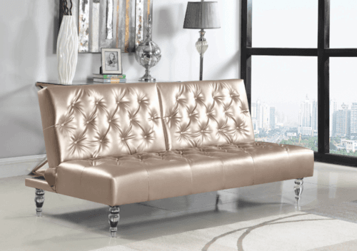 A warm, rose gold leatherette fabric is neatly tailored with the use of button tufting on the seat and back cushions