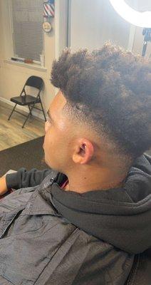 Mid fade with Afro a process that can't be rush