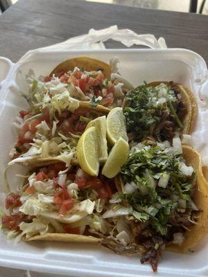 Two carnitas tacos, 1 fish taco, two shrimp tacos salsas are good but spicy beware!