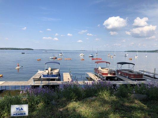 Paddleboards, kayaks and pontoon boats = summer fun.