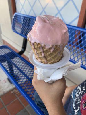 Waffle cones with strawberry, vanilla, and chocolate layers