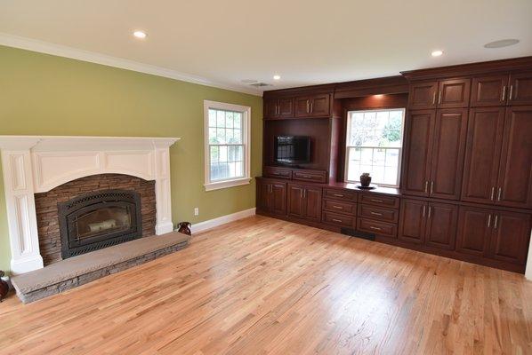 Media center with custom fireplace surround