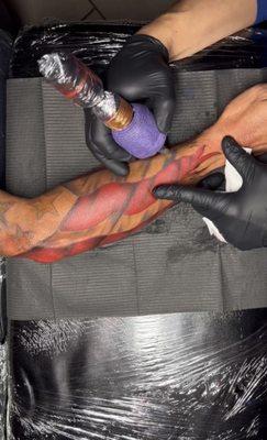 AMERICAN FLAG ARM TATTOO