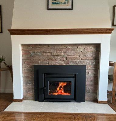 Surround updated with ledger stone and custom built mantel/ columns.