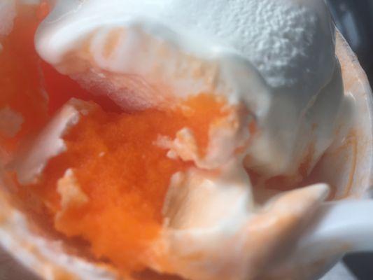 small soft serve swirled with orange ice