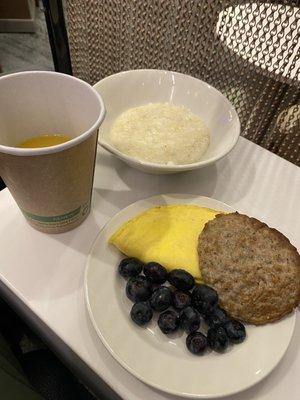 Hot breakfast. Sausage, omelette, Grits.