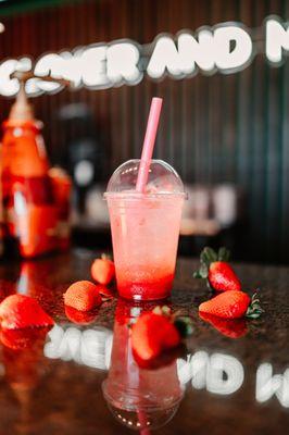 One of our signature drink called Strawberry Ade. It is a sparkling refresher with our house made puree with organic strawberries.