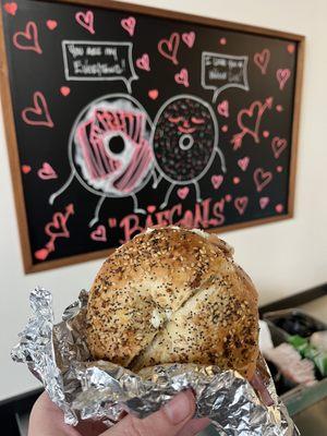 everything bagel toasted with smoked lox, scallion cream cheese, tomato, cucumber, & onions