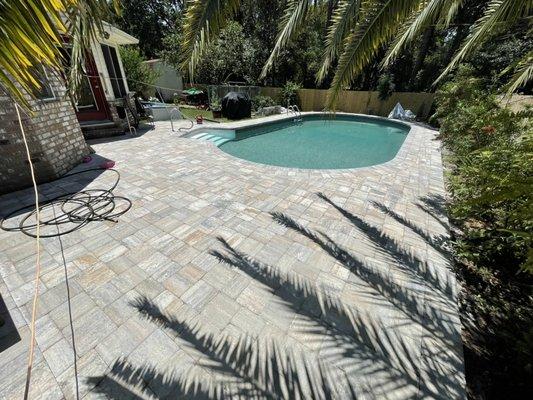 Belgard Napoli 3 piece grand cobble pool deck overlay with Seville Napoli coping