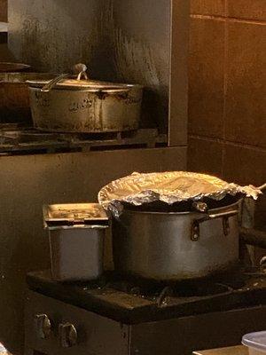 Look at the stove! she was taking my oxtail from the pot with the foil and putting it in the microwave dirty dining at its best.