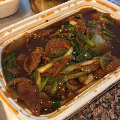 Mongolian Beef. If only the meat wasn't so cheap.  It wasn't spicy, but had a slight warmth. Very tasty with the rice however.