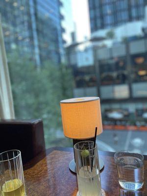 Gin tonic and a beer. Showcasing the nice view from the table.