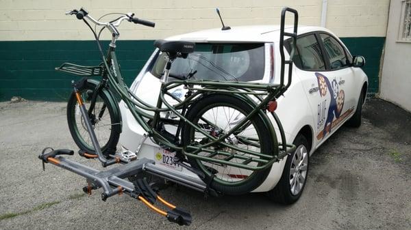 Pedego Stretch on a Kuat bike rack on a Nissan LEAF