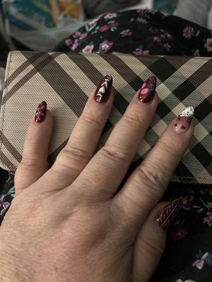 Beautiful Valentine nails I love the champagne glass that are pink several different colors in the glass. Really really nice.