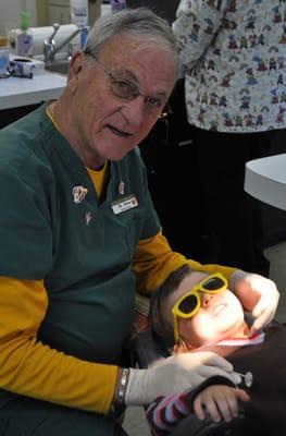 Jerry Godkin, DDS with a patient. Both Drs. Godkin & Trevino provide good quality of care. They do not accept DHMO insurance.