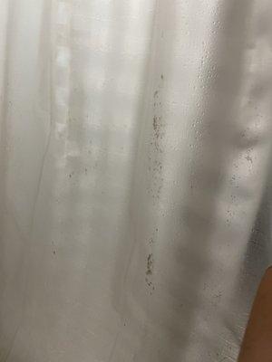 Shower curtain needs to be replaced.  Easy replacement just unsure why it wasn't addressed by housekeeping.