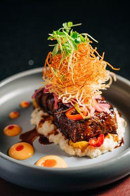 Lomo Saltado
beef tenderloin - stir-fried pepper - red onion - tomato - creamy rice - cilantro - crispy potato string