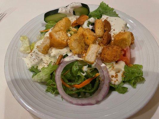 Salad with bleu cheese dressing.