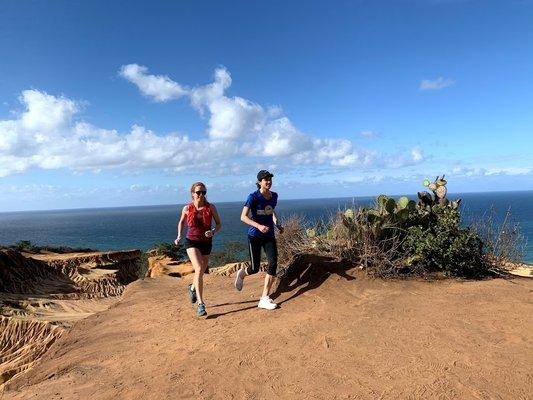 Running on new trails in San Diego on a Tend Travel experience.