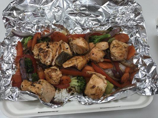 Salmon with homemade teriyaki sauce, white rice, and vegetables