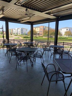 Patio overlooks fountain.