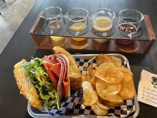 Spicy Italian sandwich and beer flight from Black Laboratory Brewing