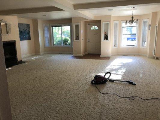 The living room before with carpet